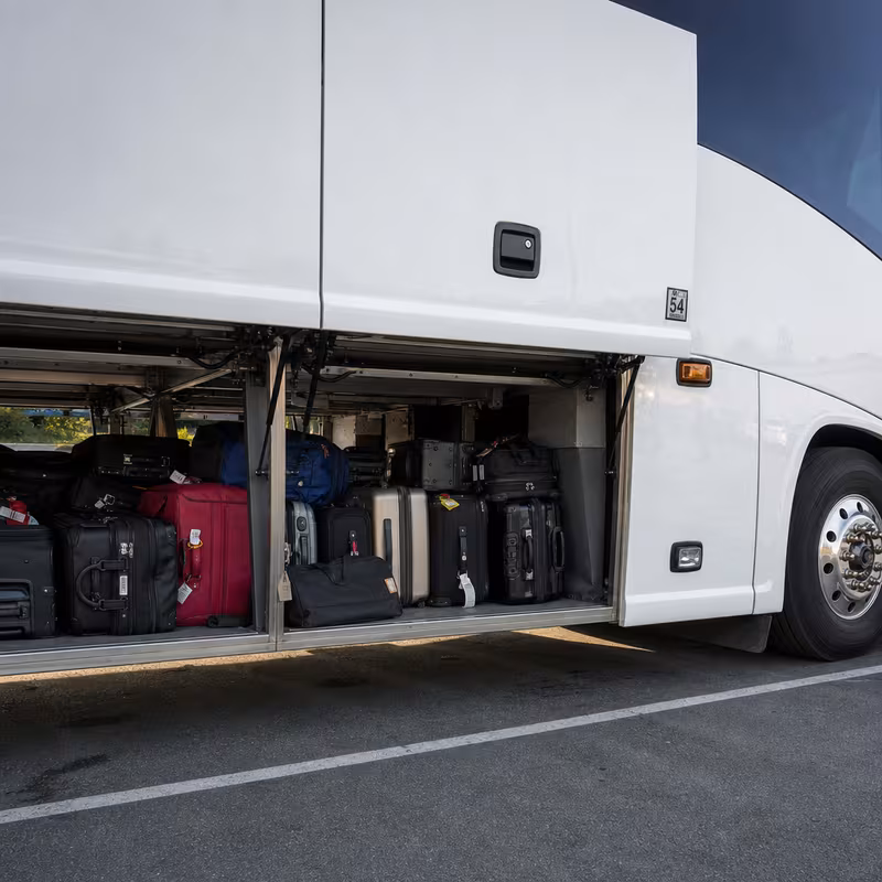 Party bus interior with wraparound leather seating and LED lighting in Paterson