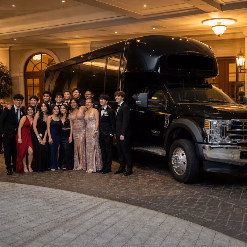 Party bus interior with wraparound leather seating and LED lighting in Paterson