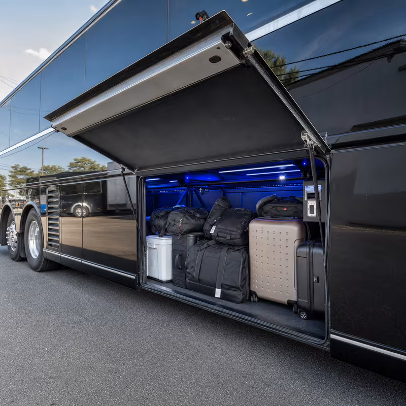 Party bus interior with wraparound leather seating and LED lighting in Paterson